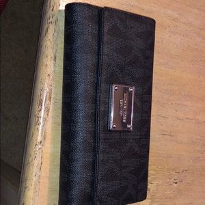 Black Michael Kore wallet.